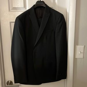 Andrew Fezza slim fit  2 piece suit. Black with gray strips not tailored